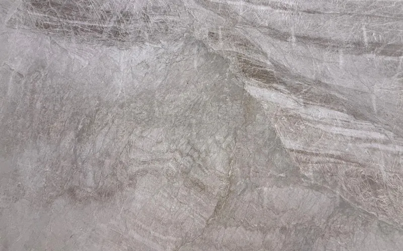 Taj Mahal quartzite, slab AC-13: a full slab in gray with white veining and taupe clouds