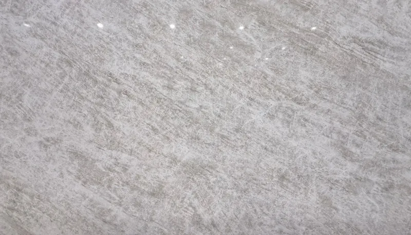 Taj Mahal quartz, slab AC-17: a full slab in light gray with diagonal taupe streaks