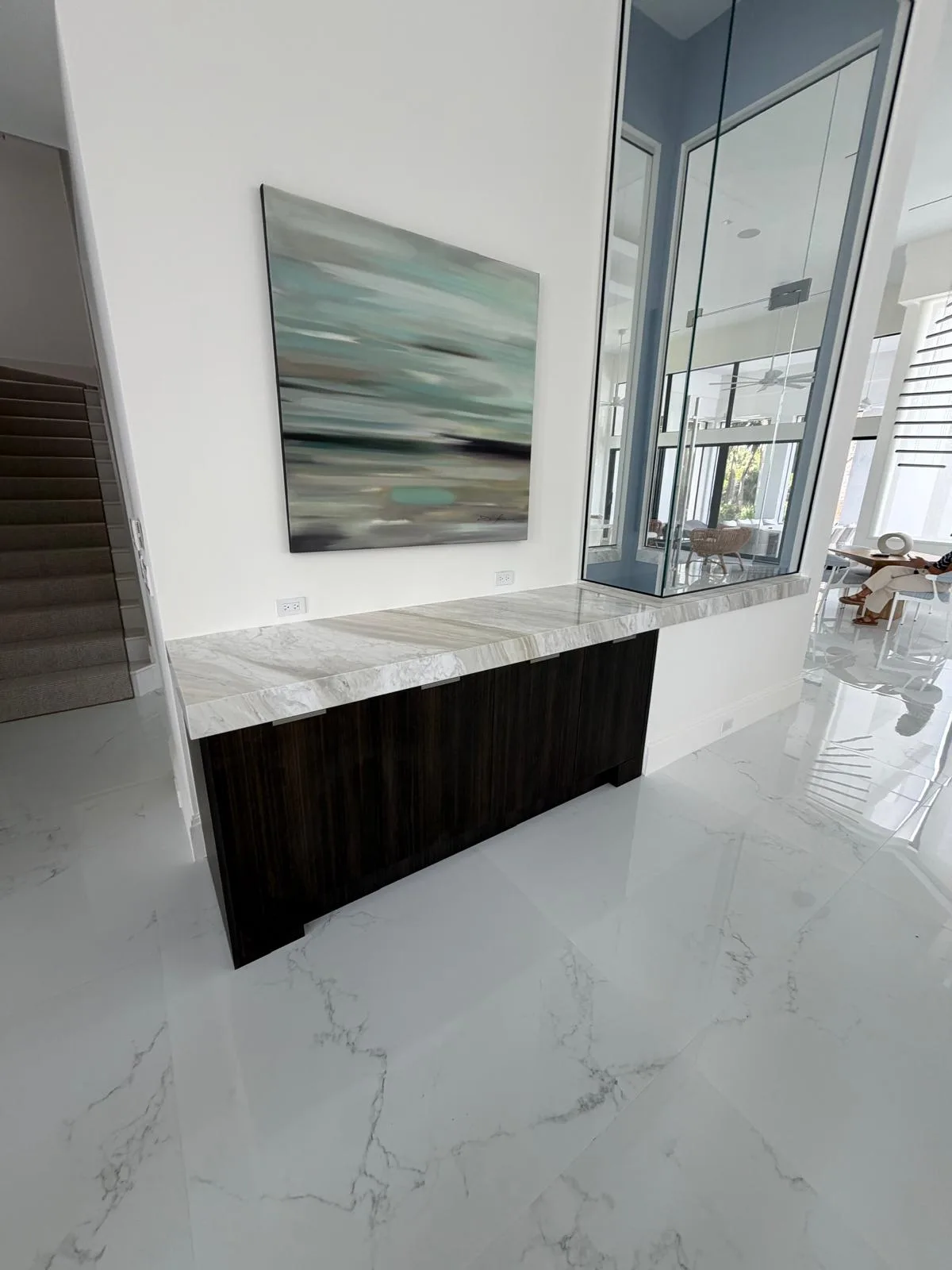 Stone countertop on a dark wood base