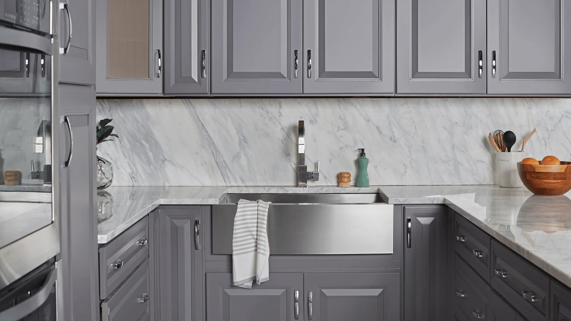 grey_raised_panel_cabinets_with_farm_sink-1367537